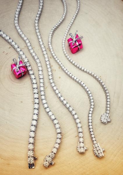 14 karat white gold lab grown diamond tennis bracelets.
2 carat=$2,500.00
3 carat=$3,000.00
5 carat=$4,300.00
7 carat=$5,500.00
9.92 carat=$7,500.00