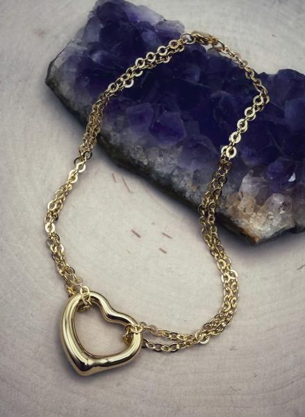 Sterling silver 22 karat yellow gold vermeil heart bracelet. $155.00