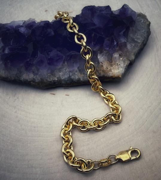 Sterling silver 22 karat yellow gold vermeil 5mm cable link bracelet. $286.00