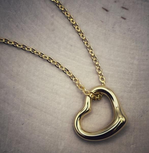 Sterling silver 22 karat yellow gold vermeil heart necklace. $165.00