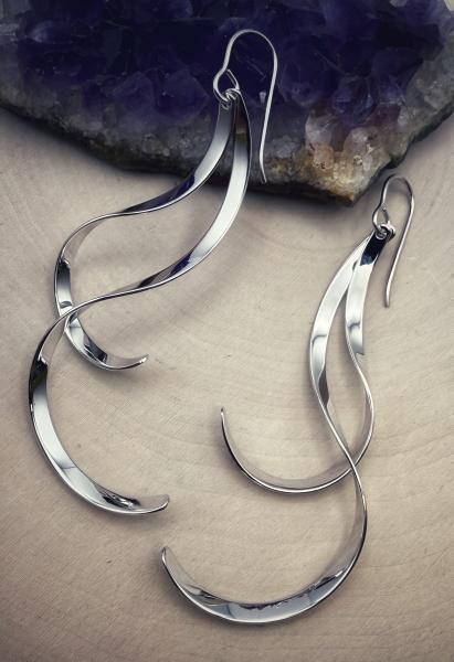Sterling silver ribbon twist dangle earrings. $170.00