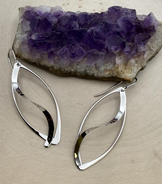 Sterling silver marquise swirl dangle earrings. $130.00
