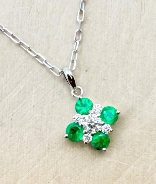 14 karat white gold emerald and diamond necklace. $1785.00