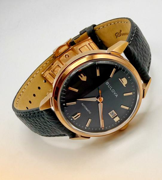 Gentlemen's Sinatra design automatic Bulova with a stainless steel and rose gold case, sapphire crystal. $895.00