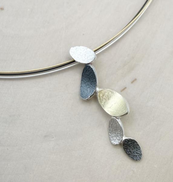Oxidized sterling silver and 18 karat gold vermeil petal design necklace. $395.00