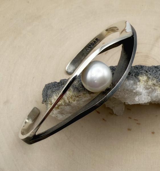 Oxidized sterling silver cuff bracelet with a 10mm freshwater cultured button pearl. $1165.00