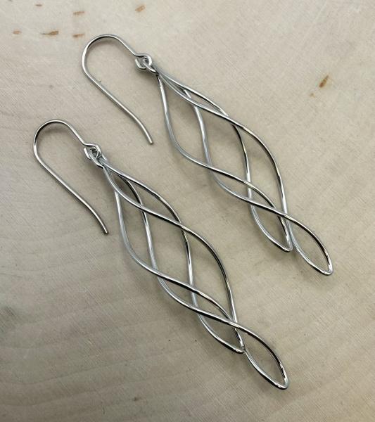 Sterling silver elongated double twist earrings. $160.00