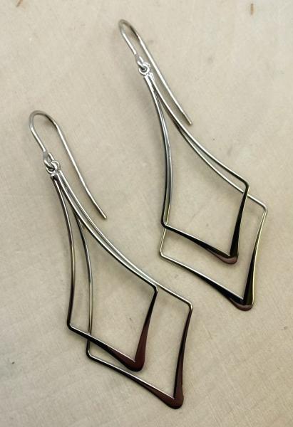 Sterling silver double diamond drop earrings. $166.00