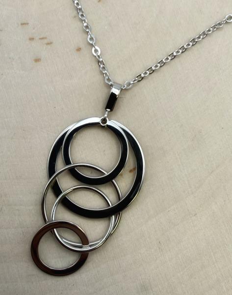 Sterling silver cascading circles necklace. $203.00
