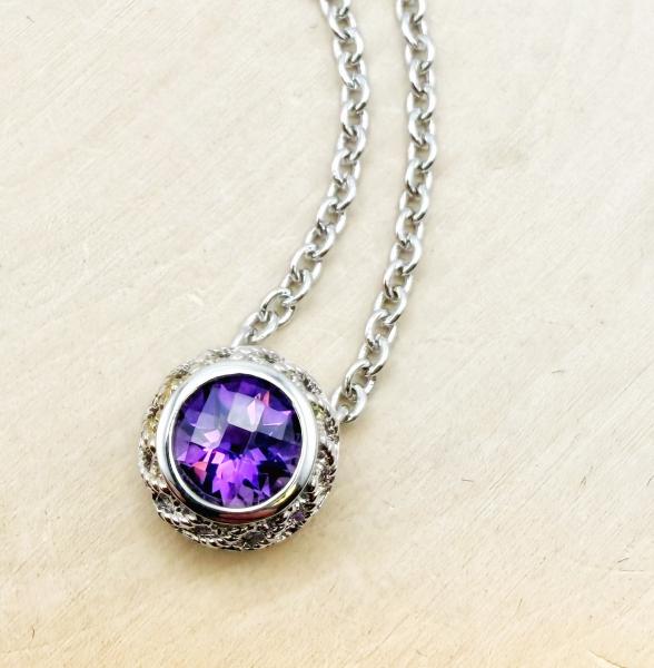 Sterling silver round checkboard cut amethyst necklace. $225.00