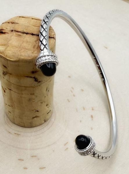 Sterling silver, black onyx and diamond cuff bracelet. $250.00