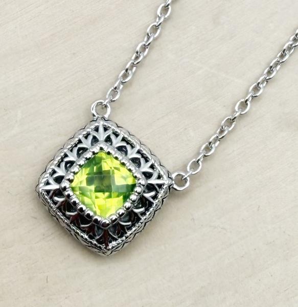 Sterling silver checkerboard cushion cut peridot necklace. $250.0