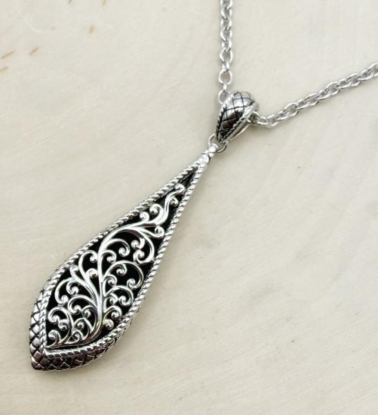 Sterling silver long teardrop filigree necklace. $325.00