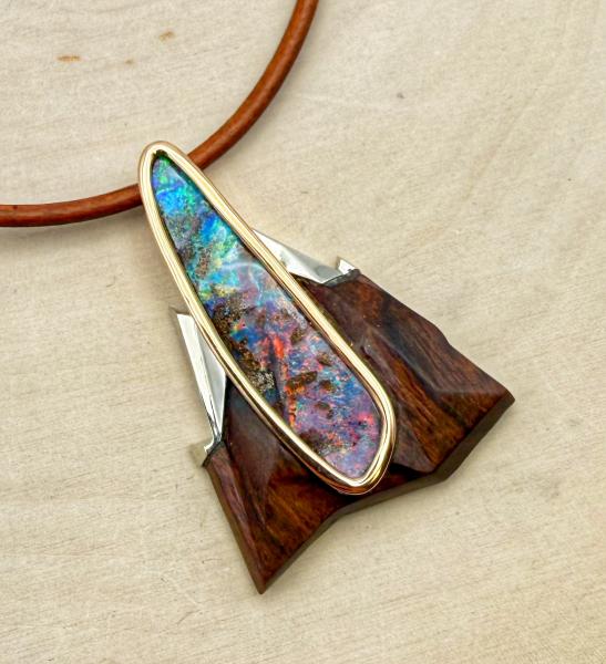 18 karat rose and white gold, carved desert ironwood, 7.95 carat boulder opal necklace, $4500.00