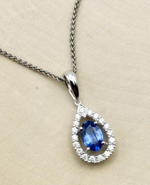 14 karat white gold sapphire and diamond teardrop necklace. $2585.00