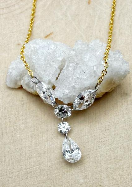 14 karat yellow gold "suspension" lab diamond necklace. 1.25 carats total weight. $2175.00