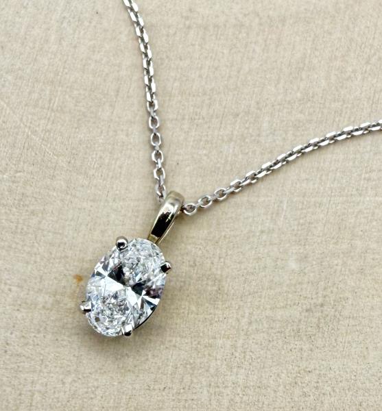 14 karat white gold 1.04 carat oval brilliant lab diamond solitaire necklace. $1427.00