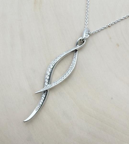 Sterling silver  and pave cubic zirconia twist necklace. $160.00
