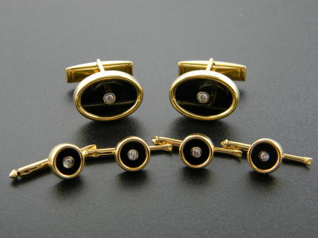 18 karat yellow gold, black onyx and diamond cuff link and stud set. $2450.00 - Online sale price= $1900.00!