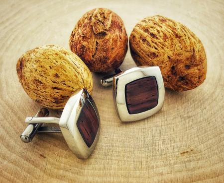 Stainless steel cuff links with wood inlay. $58.00