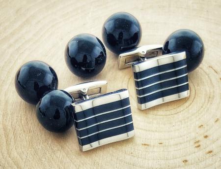 Stainless steel and black enamel "wave" cuff links. $85.00
