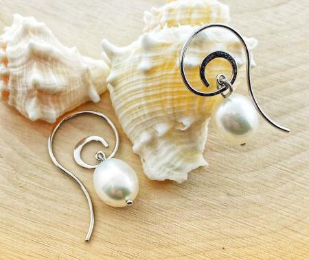Sterling silver freshwater cultured pearl scroll earrings. *Sold, please inquire about special ordering*