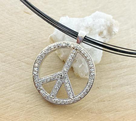 The diamond peace sign necklace. $975.00