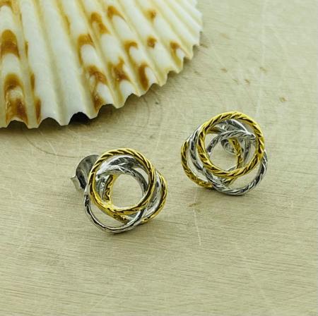 Sterling silver and yellow gold vermeil nest style post earrings, small.
$125,00