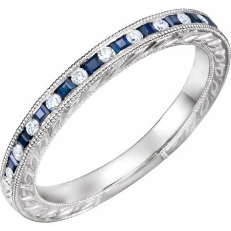 14kw 1/8ct diamond and blue sapphire engraved band. $2150.00