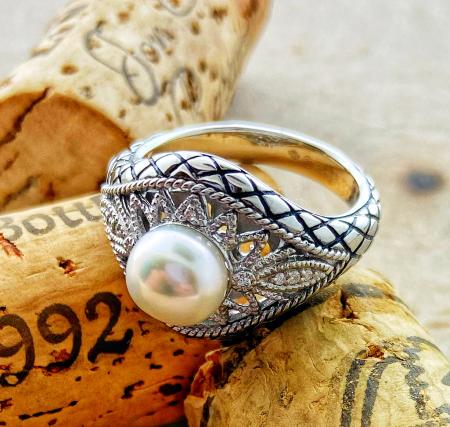 Sterling silver, diamond and fresh water pearl ring.  $200.00
