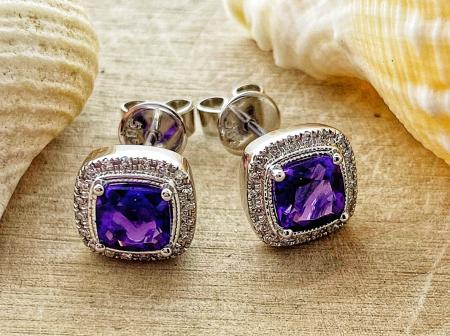 14 karat white gold cushion cut amethyst and diamond halo earrings. $925.00