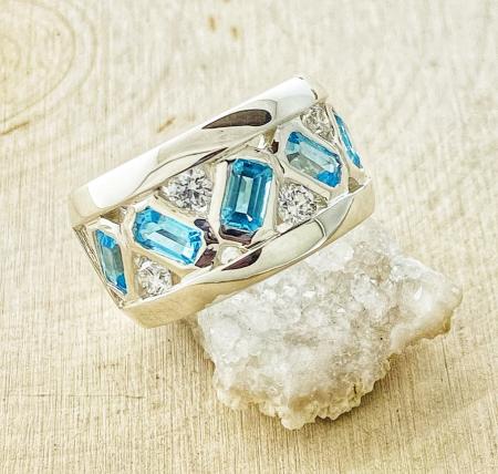 Swiss blue topaz and diamond ring fashioned in Continuum Sterling Silver. Designed by Kurt Rose *This item is sold and may be special ordered*