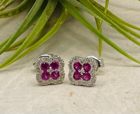 14 karat whire gold, .48ctw ruby and diamond earrings. $855.00