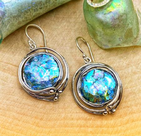 Sterling silver roman glass round pendant with decorative sculpted wire earrings.  $390.00