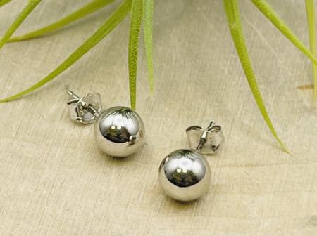 14 karat white gold 6mm ball stud earrings. $81.00