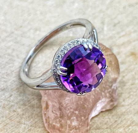 14 karat white gold 3.70ct round checkerboard amethyst and .10ctw lab diamond accented ring. $980.00