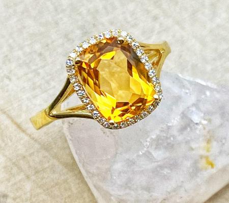 14 karat yellow gold 2.01ct cushion citrine .08ctw diamond halo split shank ring. $955.00