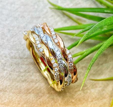 14 karat rose gold, white gold and yellow gold twist .13ctw diamond rope stacking rings. Individual rings sold separately $1045.00 each.