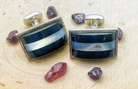 Sterling silver onyx, mother of pearl cuff links.
$140.00