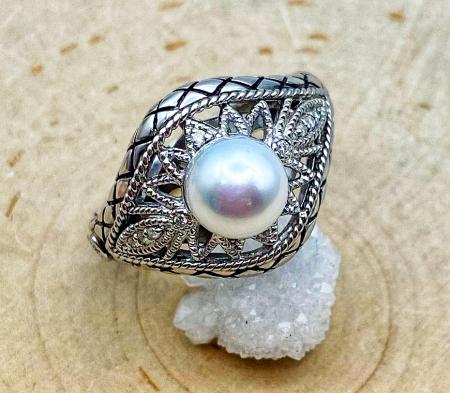 Sterling silver freshwater pearl and diamond filigree ring. $200.00