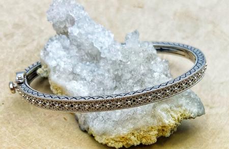 Sterling silver filigree bangle bracelet. $250.00