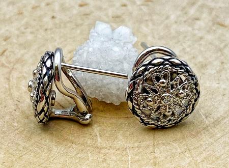 Sterling silver filigree button style and diamond earring studs. $150.00