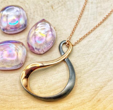 Sterling silver, 18 karat rose gold and ruthenium vermeil necklace. $190.00