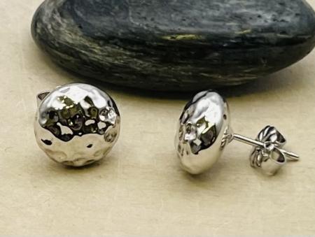 Sterling silver hammered 10mm dome earrings. $85.00