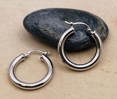Sterling silver 3x20mm tube hoop earrings. $75.00