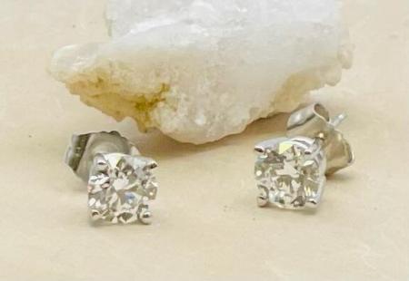 14 karat white gold four prong basket lab grown round brilliant cut diamond studs. 1.00ctw vs/SI clarity, DEF color. $1350.00- Black Friday special $1215.00