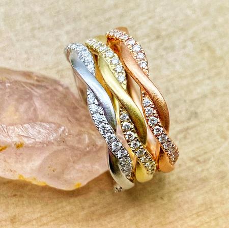 14 karat white, rose and yellow gold infinity diamond stackable rings. $4080.00 total - may be sold separately