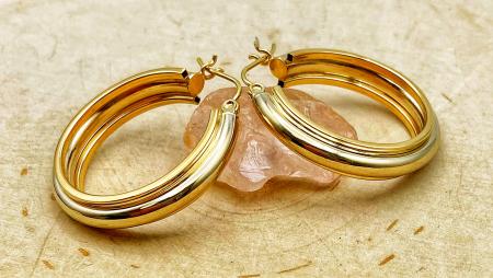 14 karat yellow and white gold hoops. $720.00