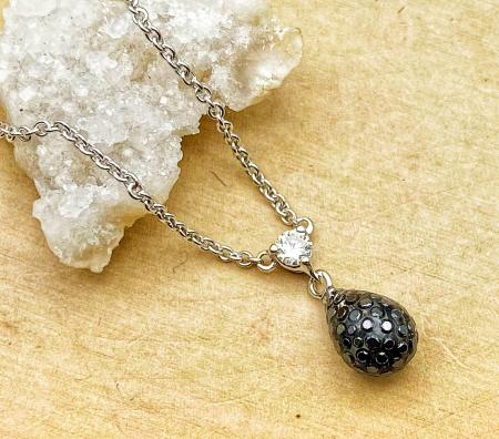 18 karat white gold .09ct lab grown diamond .74ctw black diamond carbon composite "Solare" tear drop necklace. $2700.00