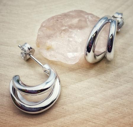 Sterling silver double hoop earrings. $135.00